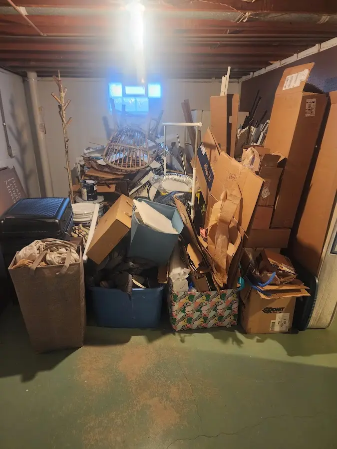 Roll-off dumpster container at job site for 2 Yard Dumpster Rental in Lathrop